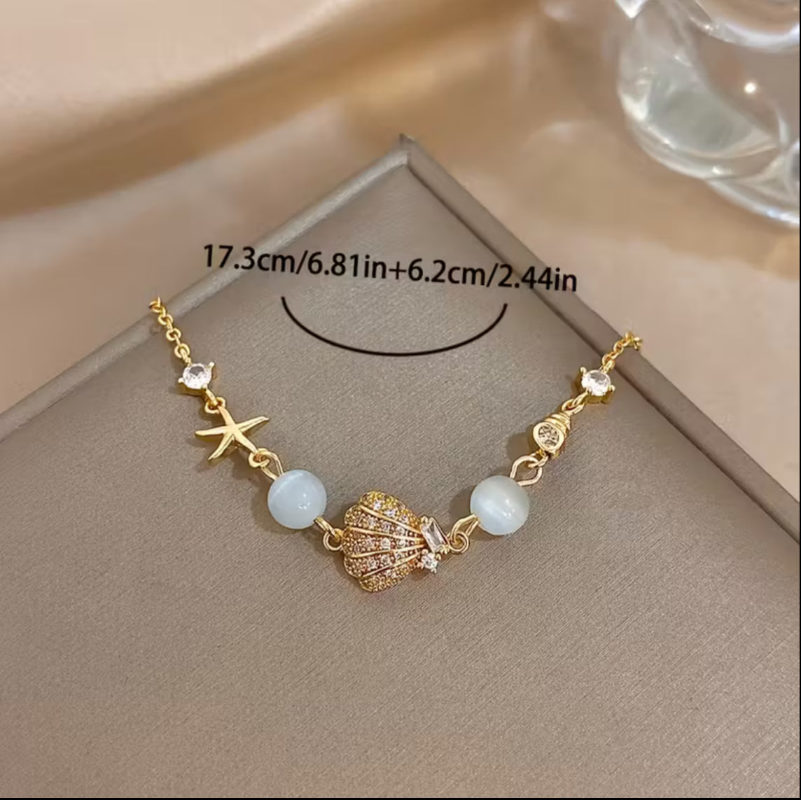 Gold-Plated Seashell & Starfish Charm Bracelet with Zirconia Accents